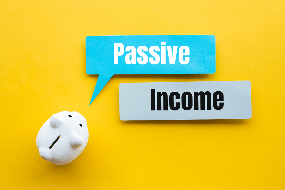 Yellow image of a piggy bank and the words passive income showing how to make money while you sleep. 