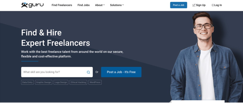 Homepage for Guru website featuring a man smiling and the caption find and hire expert freelancers. 