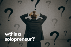 A man standing with his arms over his head and looking confused with question marks wondering what is a solopreneur.